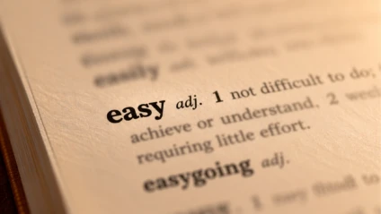 Close-up of a dictionary entry for the word easy